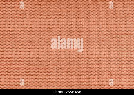 Einfarbiger orangefarbener Jacquard-Polsterstoff, Satin-Material mit gewebter Struktur, Muster Textur Hintergrund. Nahaufnahme, Textiloberfläche aus Makrogewebe. Wallp Stockfoto
