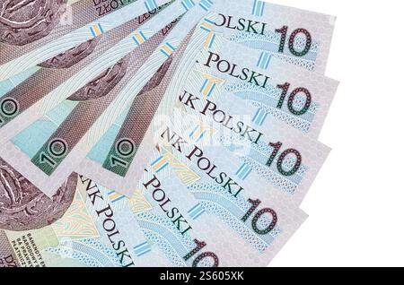 10 polnische Zloty-Scheine liegen isoliert auf weißem Hintergrund mit einem in Fächerform gestapelten Kopierraum aus nächster Nähe. Finanztransaktionen. 10 Polnisch Stockfoto
