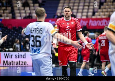 Herning, Dänemark. Januar 2025. Lukas Mertens von Germania Deutschland Nationalmannschaft, Kamil Syprzak von der polnischen Nationalmannschaft während der IHF Männer - Handball-Weltmeisterschaft - Deutschland gegen Polen, Handballspiel in Herning, Dänemark, 15. Januar 2025 Credit: Unabhängige Fotoagentur/Alamy Live News Stockfoto
