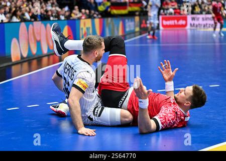 Herning, Dänemark. Januar 2025. Lukas Mertens von Germania Deutschland Nationalmannschaft, Kamil Syprzak von der polnischen Nationalmannschaft während der IHF Männer - Handball-Weltmeisterschaft - Deutschland gegen Polen, Handballspiel in Herning, Dänemark, 15. Januar 2025 Credit: Unabhängige Fotoagentur/Alamy Live News Stockfoto