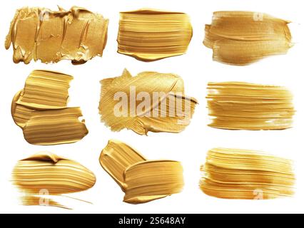 Goldene Farbstriche auf weißem Hintergrund, Set Stockfoto