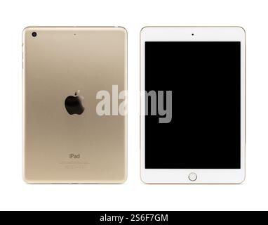 Gold Apple iPad Mini 3 Tablet-Computer mit Bildschirm, Vorder- und Rückansicht mit Beschneidungspfad auf weißem Hintergrund isoliert. Stockfoto