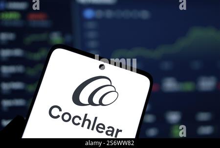 Cochlear logo is displayed on smartphone. Cochlear is a leading medical device company specializing in hearing solutions Stockfoto