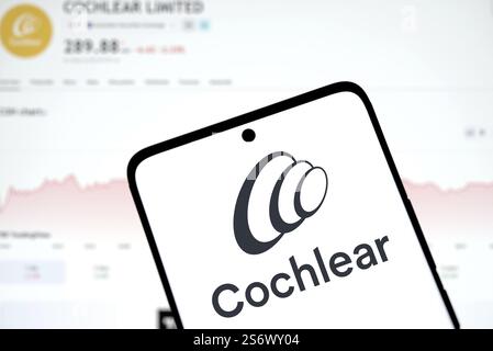 Cochlear logo is displayed on smartphone. Cochlear is a leading medical device company specializing in hearing solutions Stockfoto