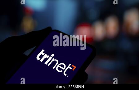 Das TriNet-Logo wird auf dem Smartphone angezeigt. TriNet Group, Inc. Ist ein Unternehmen in Dublin, Kalifornien Stockfoto
