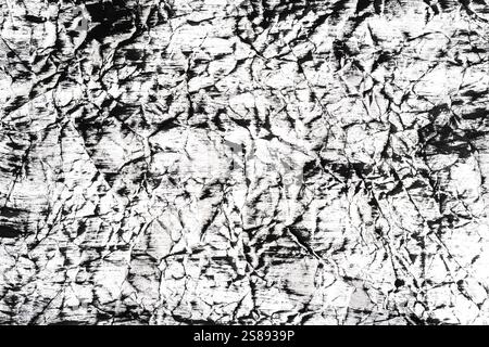 Schwarzer und weißer abstrakter Grunge-Hintergrund. Textur von zerknittertem Papier Stockfoto