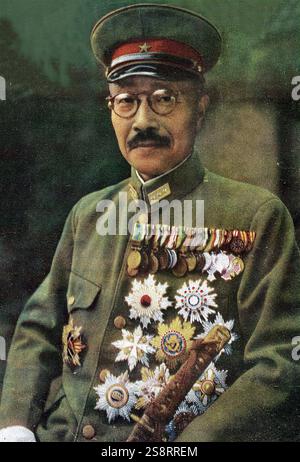 Hideki Tojo (* 30. Dezember 1884 bis 23. Dezember 1948) war ein japanischer Politiker, General der Kaiserlich Japanischen Armee (IJA) und verurteilter Kriegsverbrecher, der während des Zweiten Weltkriegs als Premierminister und Präsident der Kaiserlichen Regierungshilfe diente 1944. Während seiner Regierungsjahre war seine Führung durch extreme staatlich verübte Gewalt im Namen des japanischen Ultranationalismus gekennzeichnet Stockfoto