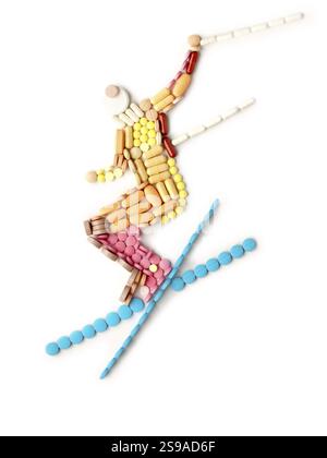 Dopingpillen und -Drogen in Form eines Skispringers Stockfoto