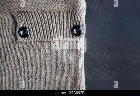 Texturmuster aus gestrickter Wolle, Strickstoff, Strickstoff, Erdton Farbe Handwerksarbeit, für Hintergrund oder Tapete mit Kopierraum Stockfoto