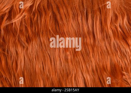 Nahaufnahme von orangefarbenem Kunstfell Stockfoto