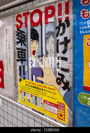 Tokio U-Bahn-Warnplakate stürmen nicht in Tokio Japn Stockfoto