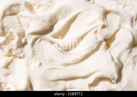 Weiße Vanilleeis Textur aus nächster Nähe. Hausgemachtes, frisch gefrorenes Joghurt-Eis, italienisches Eis. Stockfoto