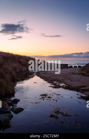 Sonnenaufgang am Togston Beach, Druridge Bay Northumberland, 2025 Stockfoto