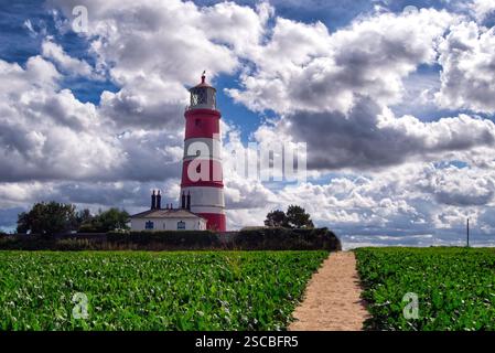 Happisburgh Leuchtturm vor einem bewölkten Himmel Stockfoto