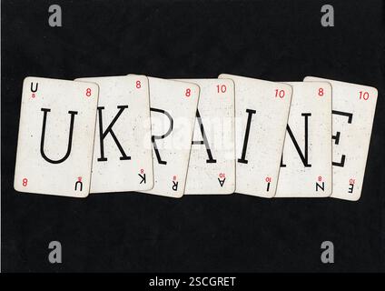 Vintage-Wortspiel-Karten, die UKRAINE auf schwarzem Hintergrund schreiben. Stockfoto
