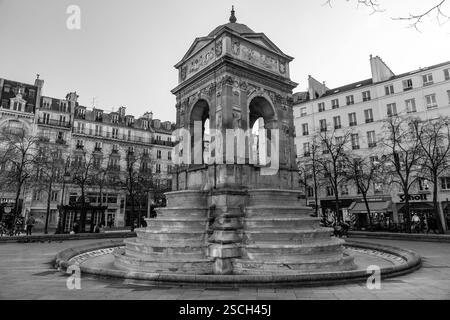 Paris, Frankreich - 24. Januar 2022: Die Fontaine des Innocents ist ein monumentaler öffentlicher Brunnen auf dem Place Joachim-du-Bellay in Les Halles Stockfoto
