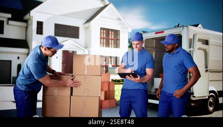 Professional Mover entlädt Kisten aus dem Van während der Hausbewegung Stockfoto