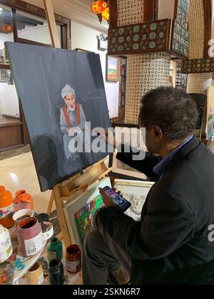 Männliche Künstlermalerei im Souk Waqif Doha Stockfoto