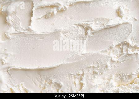 Weiße Vanilleeis-Textur als Hintergrund. Frisches Eis oder gefrorener Joghurt aus nächster Nähe. Stockfoto
