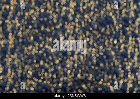 Goldener Glitzerhintergrund. Unscharfe abstrakte Kulisse Stockfoto
