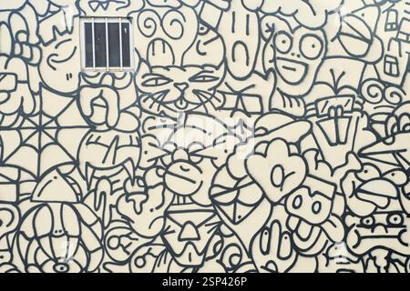 Lissabon, Portugal - 29.12.2022: Ein lebendiges und farbenfrohes abstraktes Doodle-Kunstwerk mit einer Vielzahl einzigartiger Charaktere Stockfoto