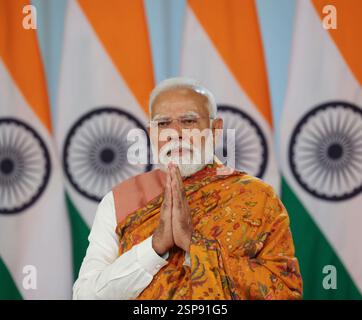 Washington DC, USA. Februar 2025. Der indische Premierminister Narendra Modi spricht über die SAMVAD IV Dialogue - A Global Hindu Buddhist Initiative for Conflict Avoidance and Environment Consciousness per Videokonferenz, 13. Februar 2025 in Washington, DC Credit: Hemant Joshi/Press Information Bureau/Alamy Live News Stockfoto