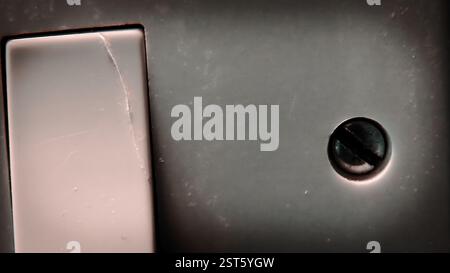 Schalter für kaputtes Licht, Makrofotografie aus der Nähe Stockfoto