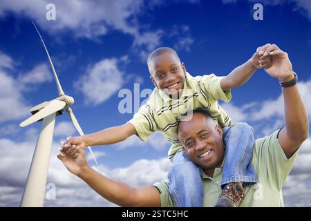 Glücklicher afroamerikanischer Vater und Sohn mit Wind Tu Stockfoto