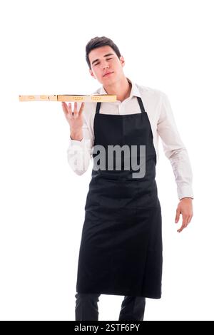 Attraktive junge Koch oder Kellner halten Pizza-Schachtel Stockfoto