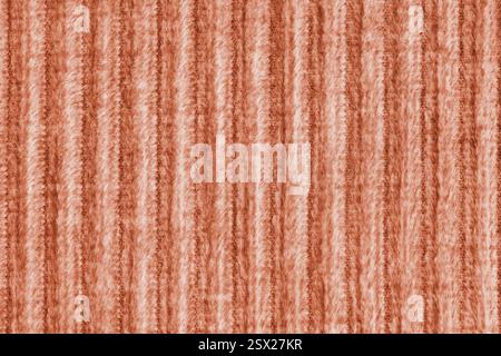 Ridge-Makrostruktur aus Velours-Cordorangengewebe. Große gerippte, grobe Websamtgewebe, gestreifte Polsterung Textur Stoff Hintergrund, Möbel t Stockfoto