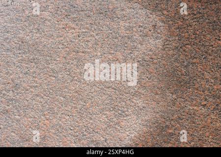 Fotografierte Nahaufnahme des roten und grauen Granitstein-Material-Oberflächenhintergrunds Stockfoto