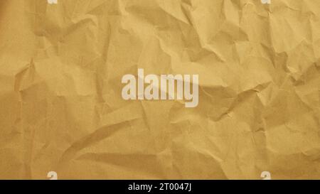Hintergrund der Papierstruktur recyceln. Zerknittertes OldÂ Kraftpapier abstrakte Form Hintergrund mit Raum Gelbes zerknittertes Papier für Text Stockfoto