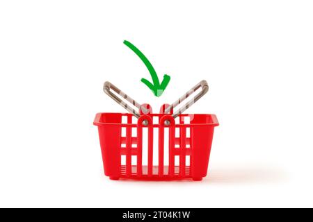 Warenkorb mit grünem Pfeil - Konzept zum Hinzufügen von Artikeln zum Warenkorb Stockfoto