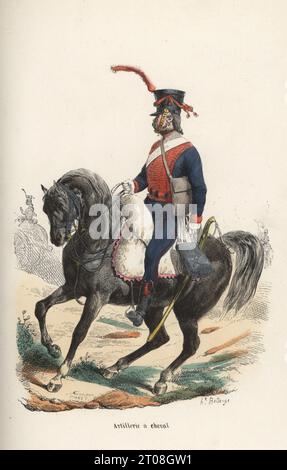 Uniform der französischen Pferdeartillerie. In Shako mit Federn, blauer Jacke im Hussar-Stil mit rotem Frosch und Reithose mit roter Paspelierung, schwarzen Stiefeln und Säbelbart, bewaffnet mit Säbel. Mouton Shabrack. Artillerie ein Cheval. Handkolorierter Holzschnitt von Henri Désiré Porret nach einer Illustration von Hippolyte Bellangé aus P. Laurent de l’Ardeches Histoire de Napoleon, Paris, 1840. Stockfoto