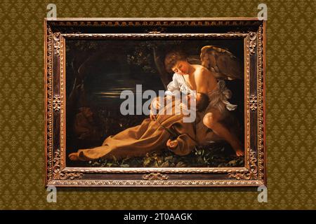 London, UK-19. Mai 2023: Das Bild des Heiligen Franz von Assisi in Ekstase zeigt einen Engel, der den Heiligen tröstet, gemalt von Michelangelo Merisi da Carav Stockfoto