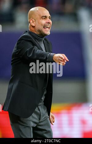 Leipzig, Deutschland. Oktober 2023. Fußball: Champions League, Spieltag 2, Gruppe G, RB Leipzig - Manchester City in der Red Bull Arena. Manchesters Trainer PEP Guardiola Gesten. Quelle: Jan Woitas/dpa/Alamy Live News Stockfoto