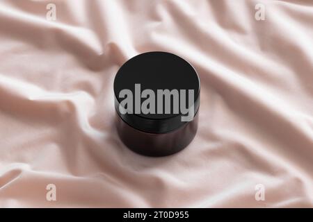 Braunglas-Modell auf dem weichen rosa Textil. Stockfoto