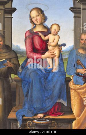 Fano (Italien, Marken. Provinz Pesaro-Urbino). Kirche Santa Maria Nuova, Pietro Vannucci bekannt als Il Perugino, Fano Altar (Jungfrau und Kind mit den Heiligen Johannes dem Täufer, Ludwig von Toulouse, Franz von Assisi, Peter und Maria Magdalena), Öl auf Platte, 1488-89 Stockfoto