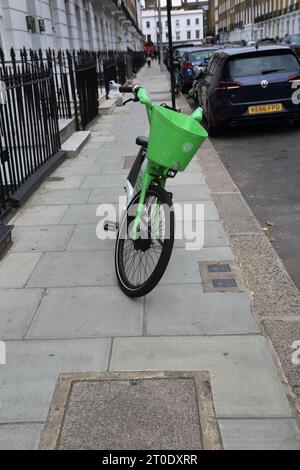 Lime e e-Bike Bike Sharing System Sydney Street Chelsea London England Stockfoto