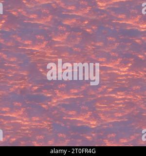 Wunderschöner Sonnenuntergangshimmel mit orangefarbenen Wolken, Illustration. Bemalung von gelben Wolken an einem hellen Sommertag. Vektor-Illustration des Sommerhimmels. Naht Stockfoto