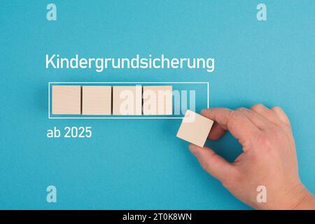 Grundgeld für Kinder, ab 2025, deutsche Sprache, neue Zahlungsregelung für Familien in Deutschland, soziale Fragen Stockfoto