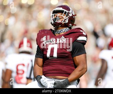 7. Oktober 2023: Texas A&M Defensive Lineman Walter Nolen (0) reagiert auf einen Defensive-Sack von Alabama Quarterback Jalen Milroe (4) während eines NCAA College Football-Spiels am 7. Oktober 2023 in College Station, Texas. Alabama gewann mit 26:20. (Kreditbild: © Scott Coleman/ZUMA Press Wire) NUR REDAKTIONELLE VERWENDUNG! Nicht für kommerzielle ZWECKE! Stockfoto