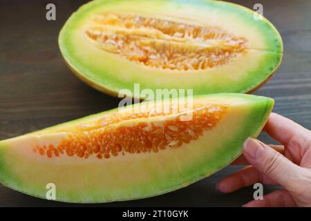 Nahaufnahme ein Stück frischer reifer, saftiger Thai-Moschusmelone Stockfoto