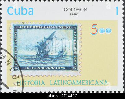 Gestempelte Briefmarke, gedruckt von Kuba, auf der alte argentinische Briefmarke, lateinamerikanische Geschichte, um 1990 zu sehen ist. Stockfoto