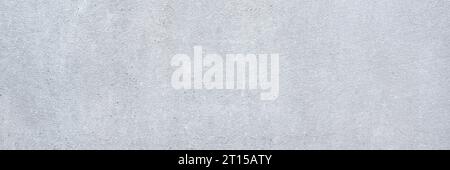 Graue Hintergrundtextur der Betonwand im Bannerformat. Hochauflösendes echtes Foto. Stockfoto