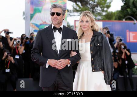 VENEDIG, ITALIEN – AUGUST 31: Patrick Dempsey und Jillian Fink besuchen den roten Teppich für den Film „Ferrari“ beim 80. Internationalen Filmfestival in Venedig Stockfoto