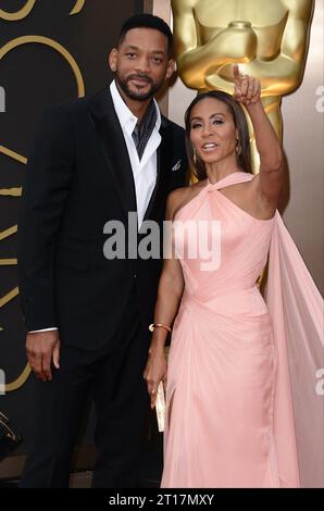 Los Angeles, Usa. Oktober 2023. Dateifoto vom 2. März 2014 von will Smith und Jada Pinkett Smith bei der Ankunft bei den 86. Academy Awards im Dolby Theatre in Hollywood, Los Angeles, CA, USA. Jada Pinkett Smith hat in einem neuen Interview bekannt gegeben, dass sie und ihr Mann will Smith seit 2016 getrennt sind. Obwohl die Schauspieler sieben Jahre lang völlig getrennte Leben führten, waren sie nicht bereit, die Nachrichten öffentlich zu bestätigen, gab sie NBC zu. Foto: Lionel Hahn/ABACAPRESS.COM Credit: Abaca Press/Alamy Live News Stockfoto