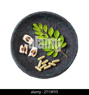 Moringa Blätter, Samen und Kapseln - Moringa oleifera Stockfoto