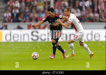 Tolgay Arslan (8 - HSV) Aktion gegen Matthias Lehmann (33 - 1.FC Köln) 1.FC Köln - Hamburger SV 0:0 Fußball Bundesliga Saison 2014/2015 in Köln, Deutschland am 23.08.2014 Stockfoto