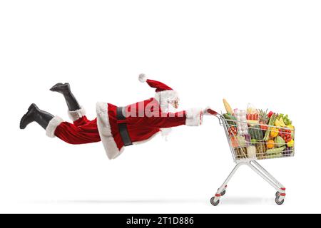 weihnachtsmann, der einen Einkaufswagen mit Essen auf weißem Hintergrund hält Stockfoto